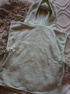 Geborduurde badponcho