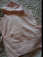 Geborduurde badponcho