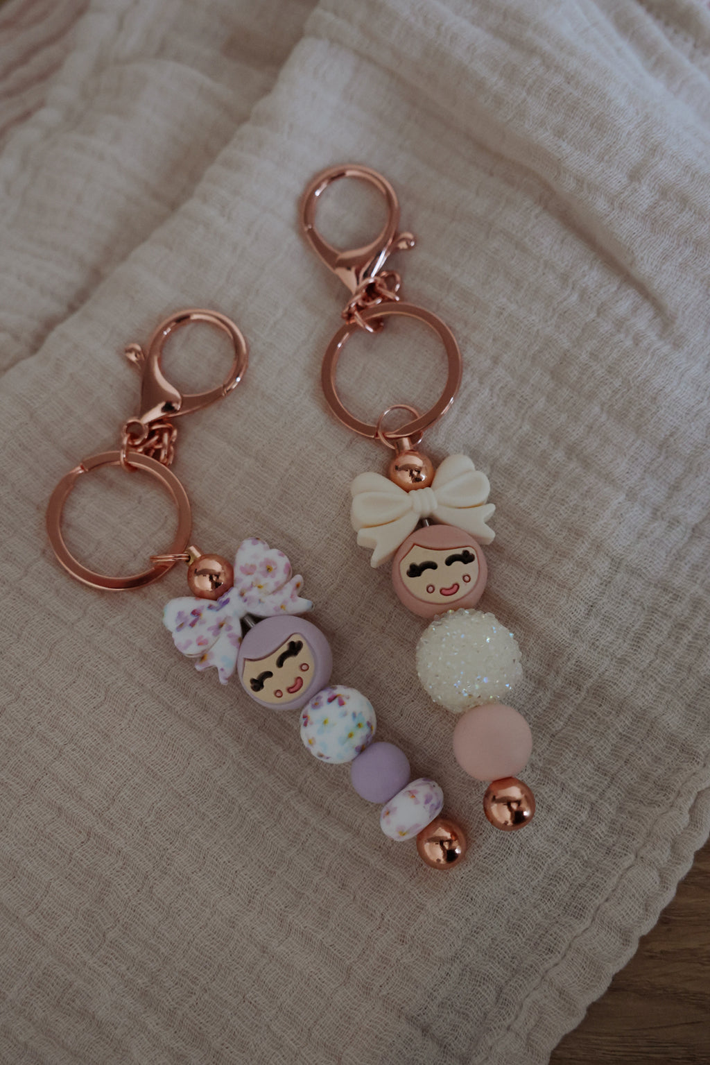 Popje van geluk - staafje sleutelhanger