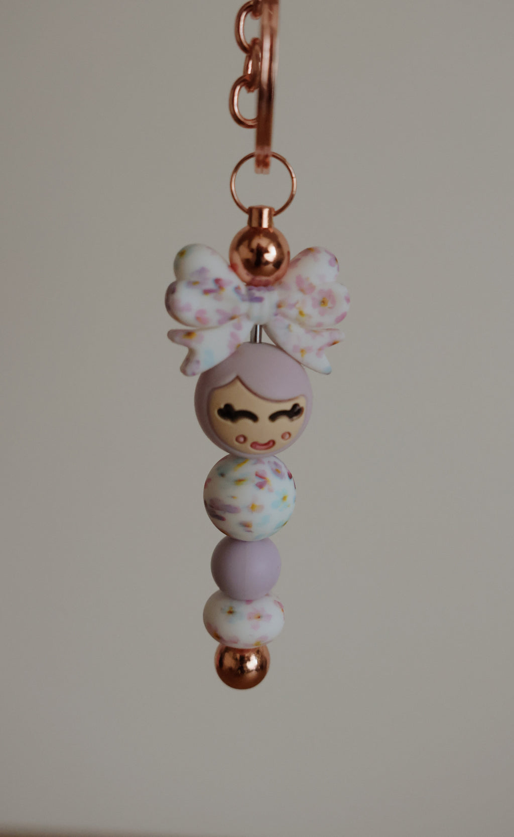 Popje van geluk - staafje sleutelhanger