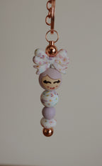 Popje van geluk - staafje sleutelhanger