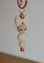 Popje van geluk - staafje sleutelhanger